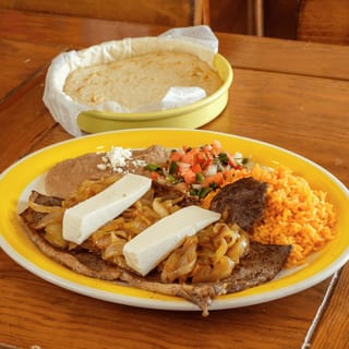 Bistec Encebollado (Steak with Sautéed Onions)