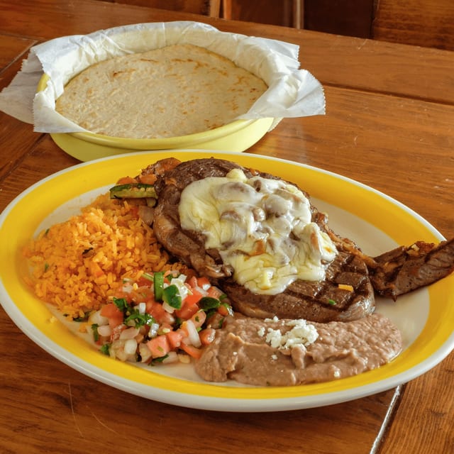 Bistec Xochiimilco (Ribeye Steak Xochimilco Style).