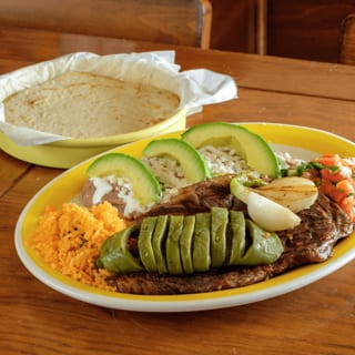 Bistec con Enfrijoladas (Ribeye Steak with Enfrijo)