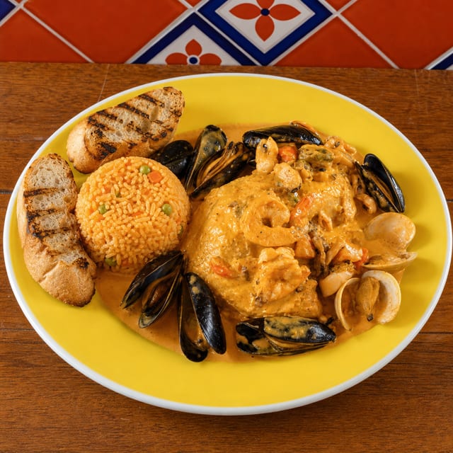 Filete con Mariscos (Tilapia Fillet with a Seafood Medley).