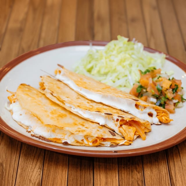 Tinga de Pollo (Shredded Spicy Chicken Breast) Quesadilla.