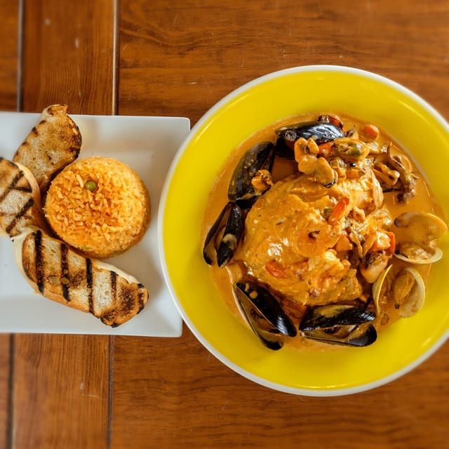 Filete con Mariscos (Tilapia Fillet with a Seafood Medley).